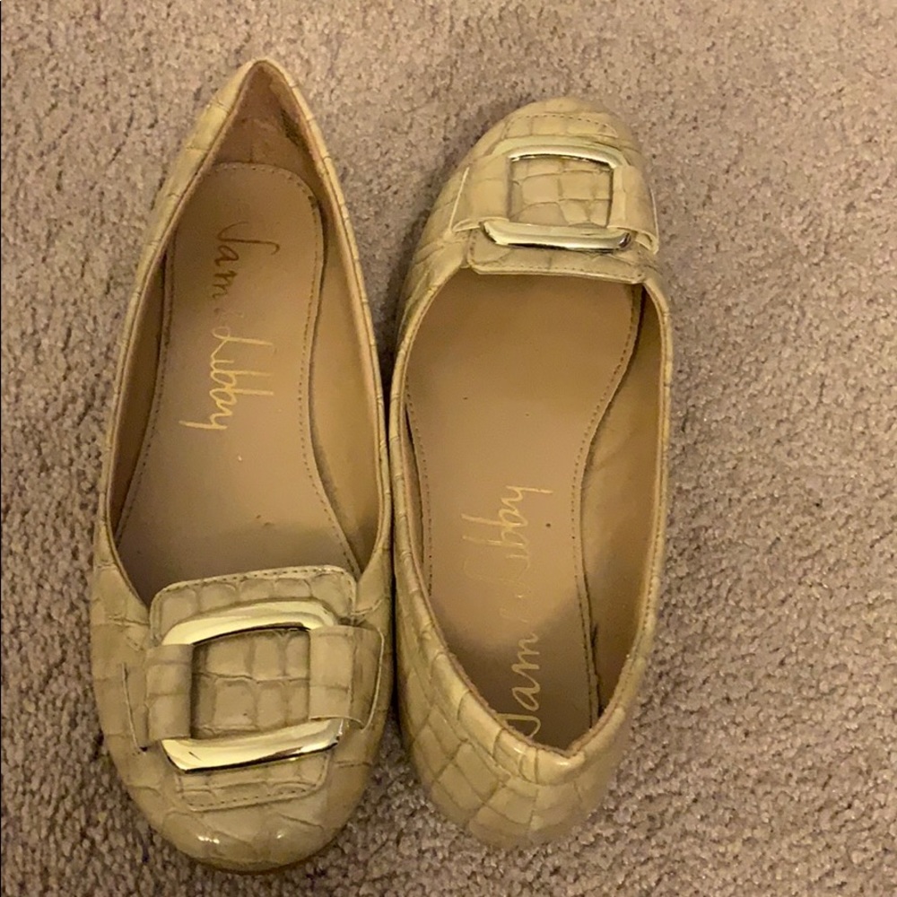 Tan flats with snake print and gold embellishment